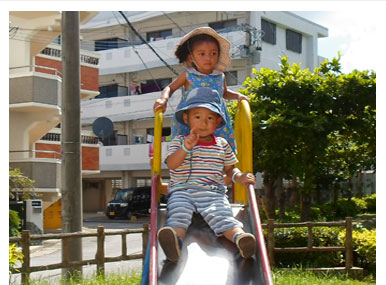 Two children on slide